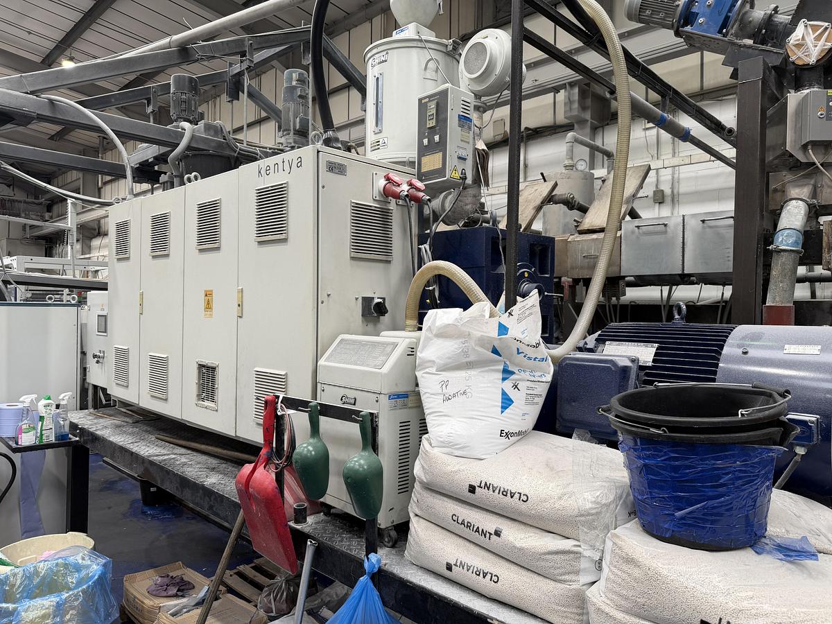 Used 1100mm wide Kentya coextrusion PET sheetlinewith 73mm twinscrew primary extruder, triple vented. 90kw AC motor, screen changer, gear pump 1100mm die, 3 roll stack, haul off, silicone bath, 2 state winder 2010