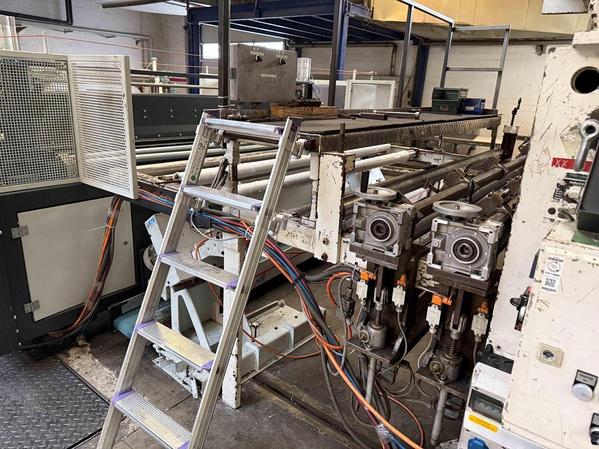 Used 2400mm wide Reifenhauser 3 roll polishing stack with thermoregulation, haul off. 2400mmx500mm individual drives. Variable speed haul off. In line knives.
