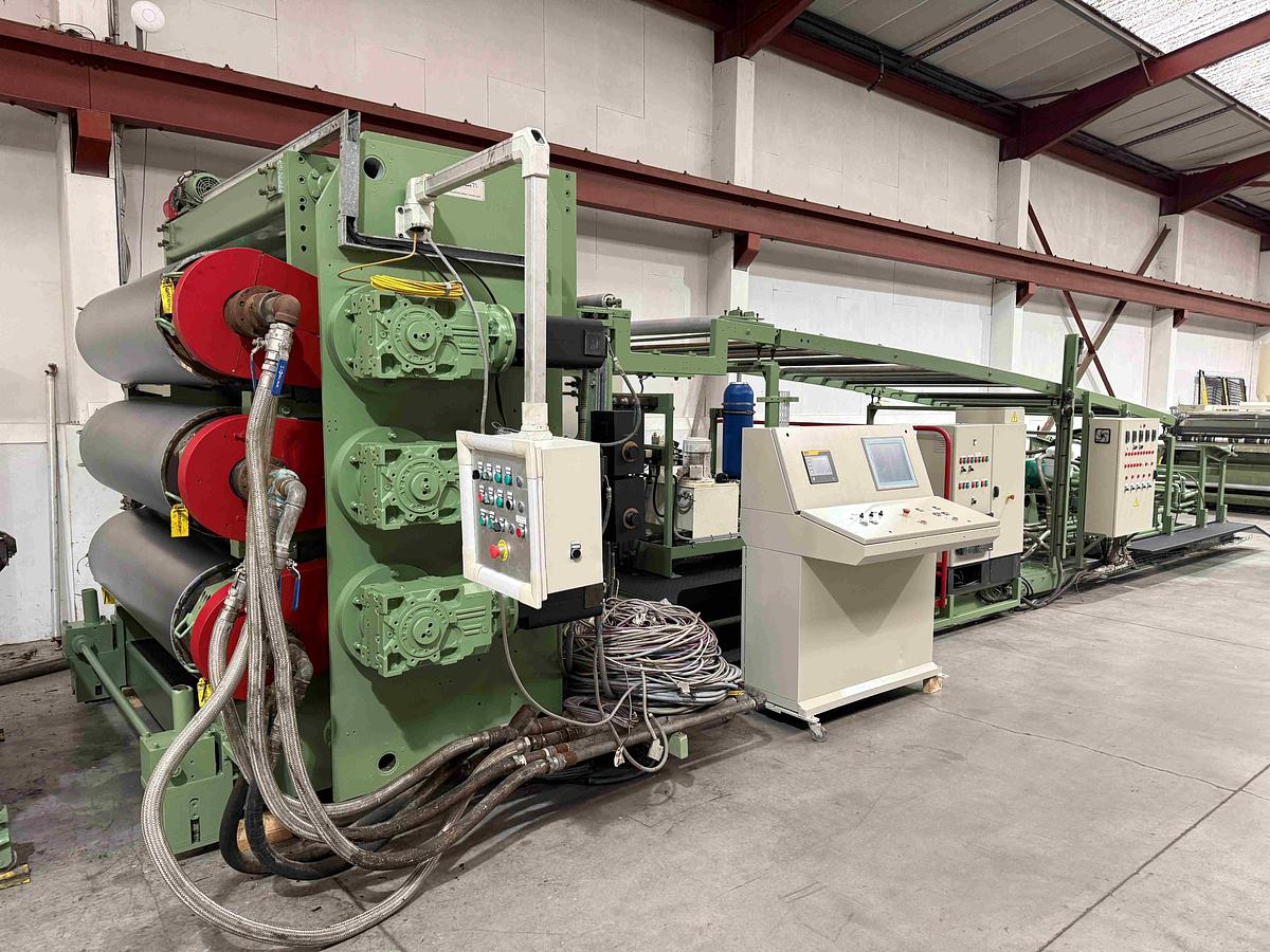 Used 1900mm wide Omam 3 roll polishing stack with 500mm dia rolls pump group and haul off. Spare rolls, hydraulic nip with pump unit, haul off. Operator panel.