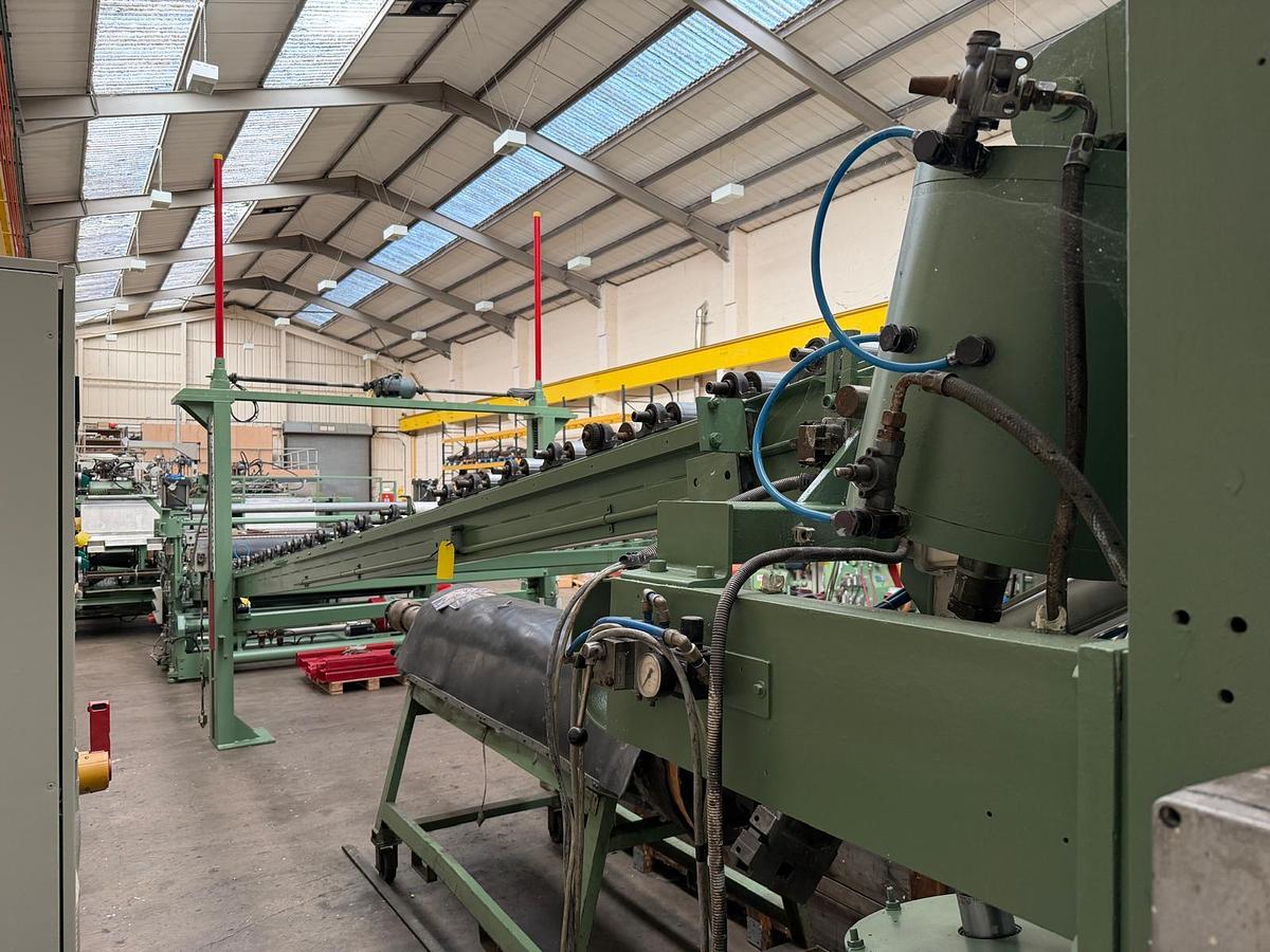 Used 2400mm Reifenhauser coextrusion sheet extrusion. 175mm Erwepa extruder, 90mm coextruder gear pump, Feedblock 2400mm die, 2400mm x 500mm rolls haul off in line knives.