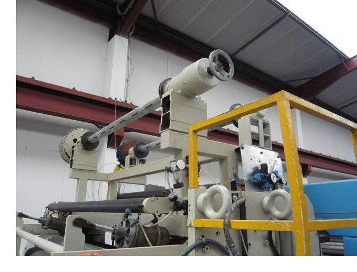 Used 1860mm wide Krauss Maffei Omipa sheet extrusion line. KMD130 Krauss Maffei extruder, 1800mm wide Omipa 3 roll stack, haul off, 2 station winder 1990