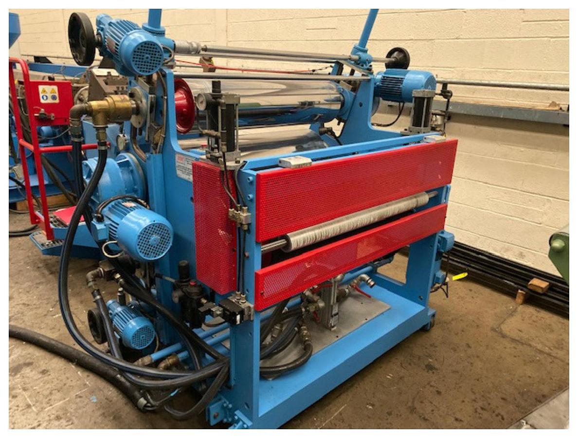 Used 1000mm Union 3 roll polishing stack with 250x350x350mm rolls. Model TAV1000.   1000mm wide close coupled 2 roll haul off Sella 3 zone pump group