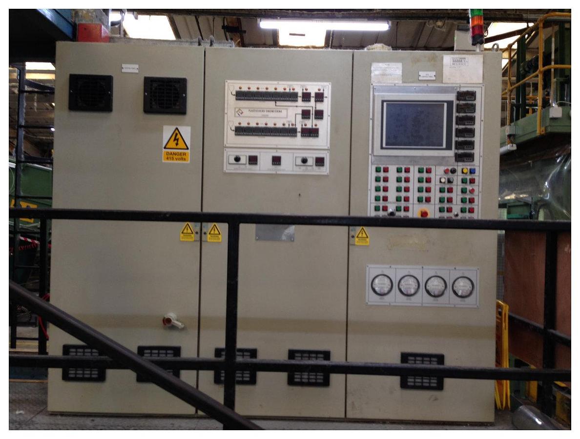 Used 600mm wide Plasticisers PP staple fibre line with 150mm and 60mm extruders. Complete with godets, ovens, crimper for 6-20 denier fibres. Up to 650kg/hr 1997