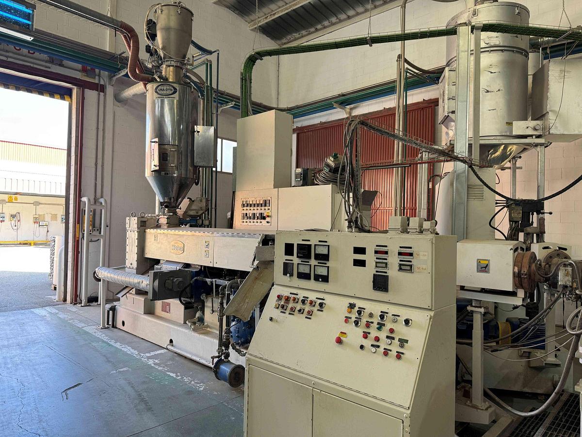 Used 1300mm wide Welex coextrusion sheet line with 120mm and 63mm extruders, 1300mm die, 1350x450mm roll stack, haul off winder. Crystalliser, dryer. 1997