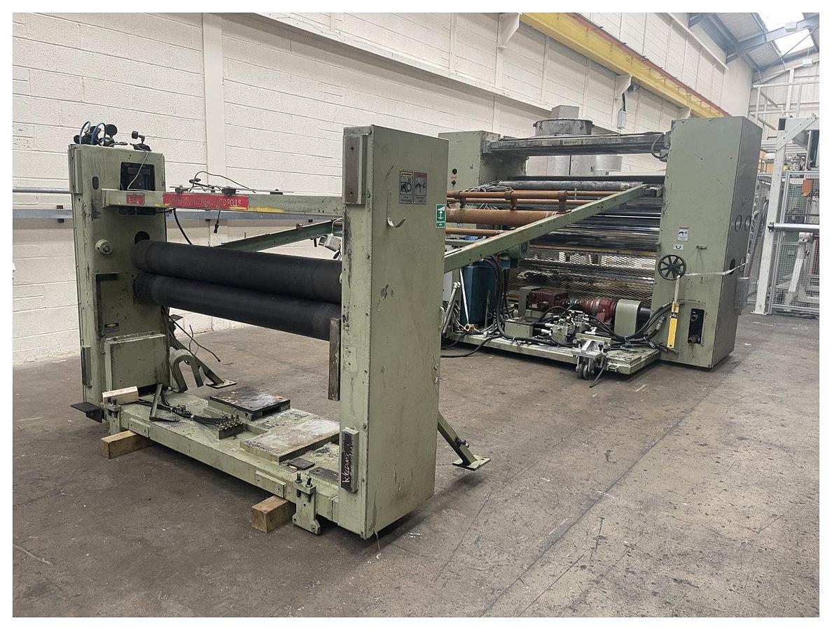 Used 1956mm Wide Welex 3 Roll Polishing Stack. 450mm diameter chrome rolls. . Hydraulic nip with power pack and accumulator. 2 roll haul off