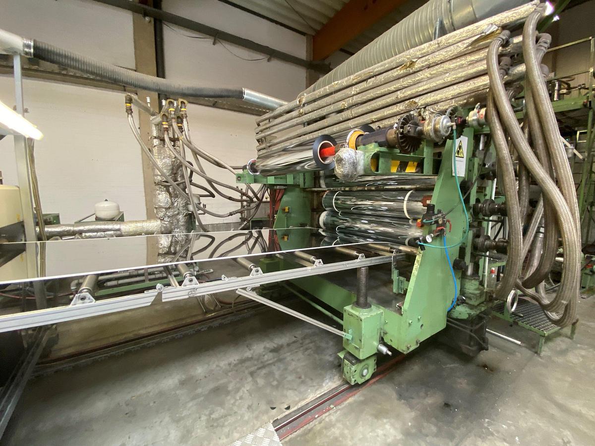 Used 1800mm wide Kuhne sheet extrusion line with 125mm primary Kuhne extruder, 1600mm flex lip die 1800mm 350mm diameter rolls, haul off guillotine