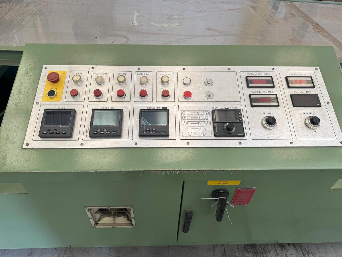 Used 890mm x 300mm Welex 3 roll polishing stack with pump group, and haul off. Silent chain driven rolls, pneumatic nip, 97