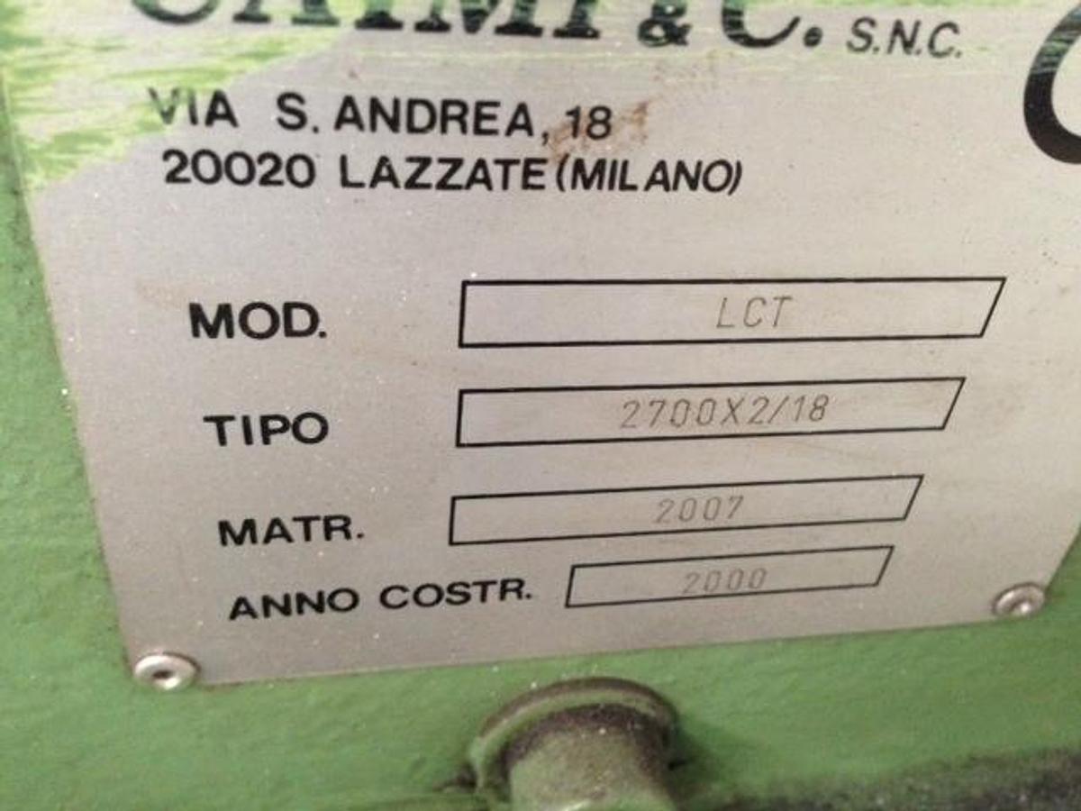 Used 2700mm wide in line and cross cut saw. Was running up to 12mm thick sheets. 3 in line saws and single cross cut with integrated haul off. Year 2000