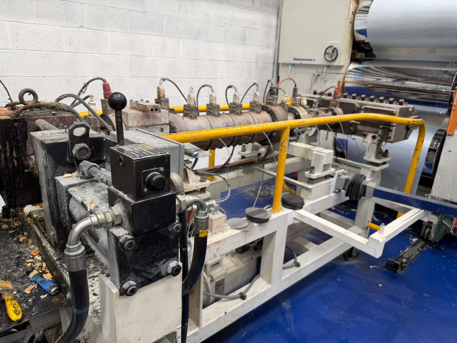 Used 1000mm wide Battenfeld sheet extrusion line. 120mm extruder, gear pump, 900mm die, 1000mm x 450mm stack, haul off 2 station winder.