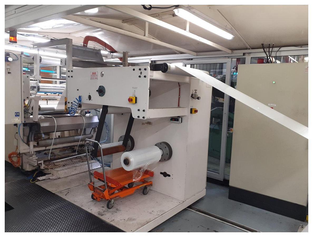 Used 800mm Wide Mondon Dual Station Winder. 500mm Max roll diameter 500mm. Model 1711 1998. PET/PP sheet