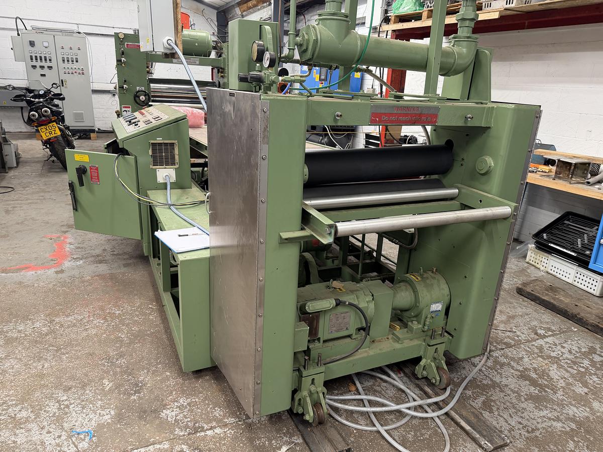 Used 890mm wide Welex 3 roll polishing stack with 300mm diameter rolls. 3 zone pump group. pneumatic nip, haul off. 1997