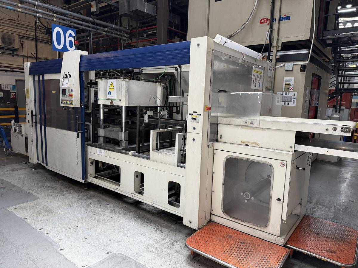 Used 500mm x 350mm Illig Model RD53 pressure forming machine 2004 with unwind and stacker
