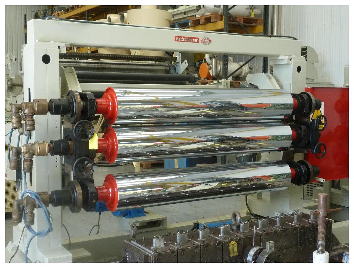 Used 1800mm wide Reifenhauser sheet extrusion line. 120mm Reifenhauser extruder, melt pump, 1700mm die, 3 roll stack, pump group, haul off, cross cut saw.