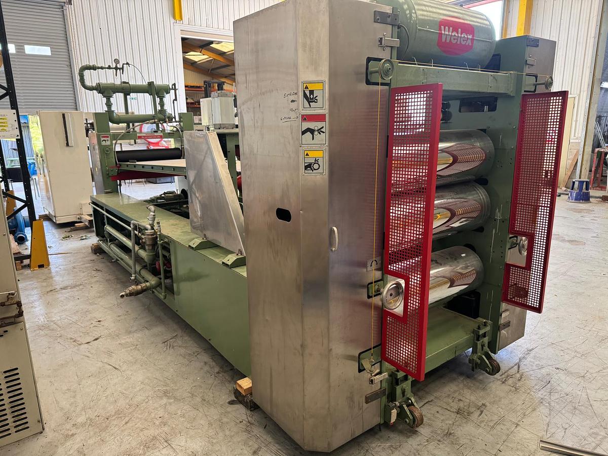 Used 890mm x 300mm Welex 3 roll polishing stack with pump group, and haul off. Silent chain driven rolls, pneumatic nip, 97