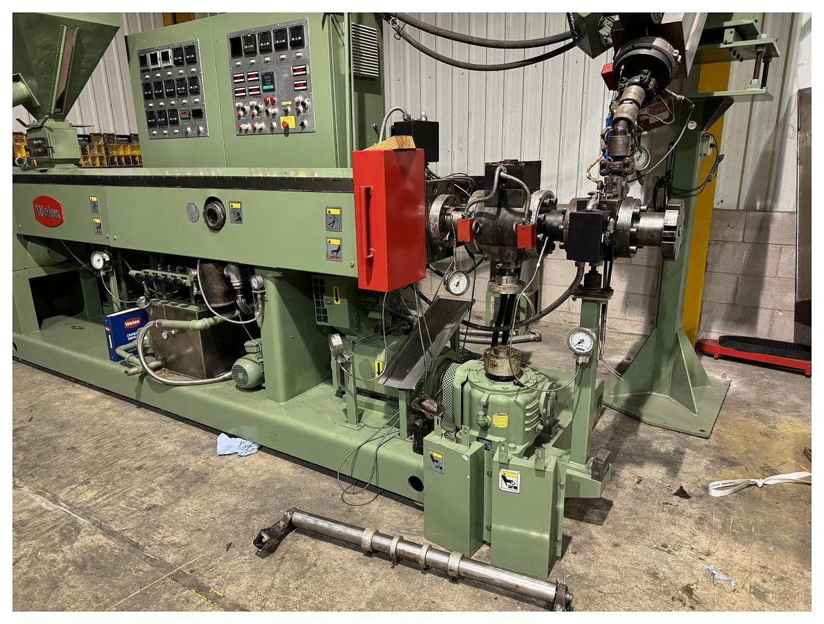 Used 1040mm wide Welex coextrusion sheet line with 90mm + 50mm extruders, GP, die, 1040mm wide x 450mm calender, pumps, haul off winder. 1996