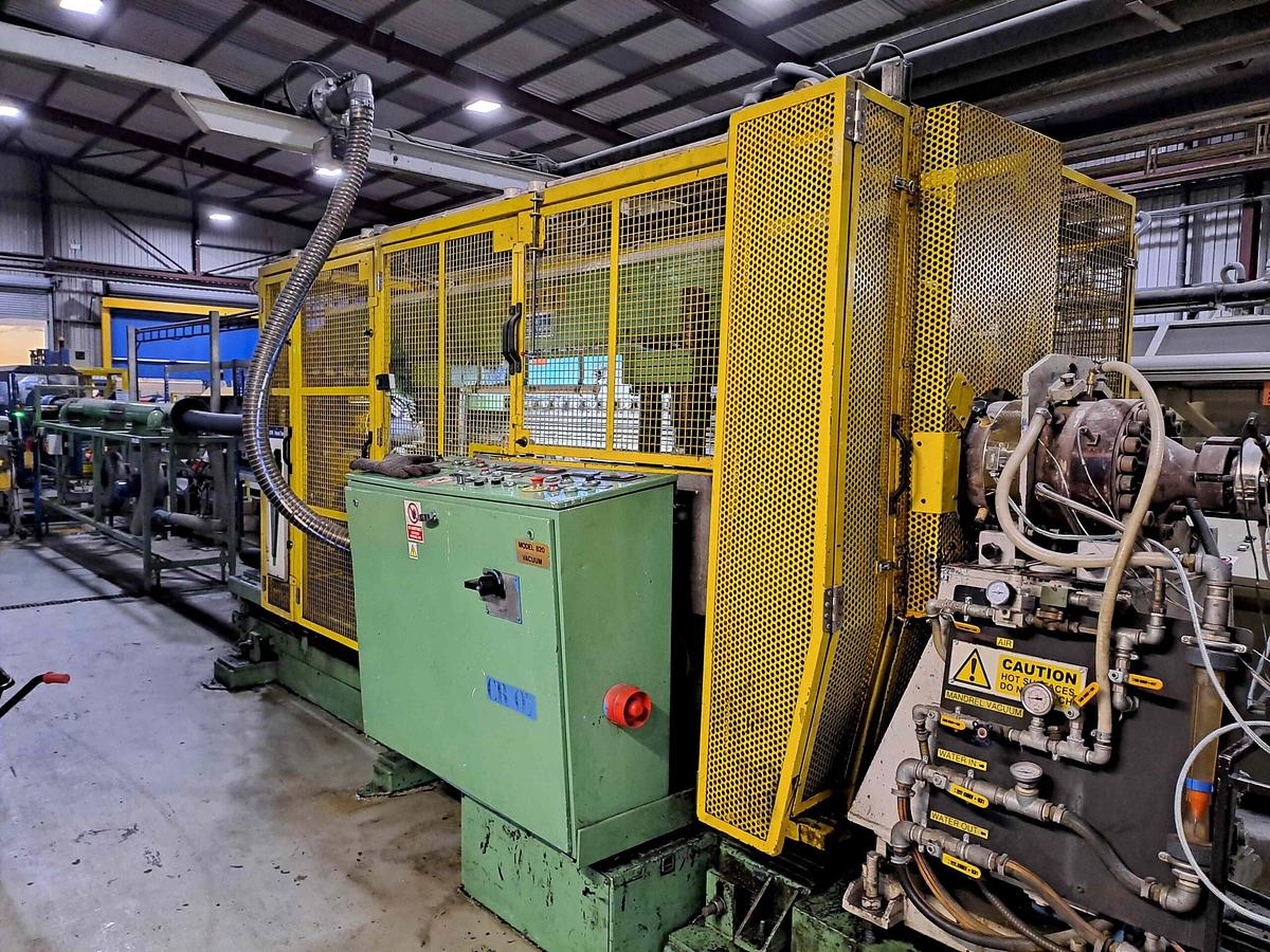 Used 250mm Battenfeld corrugated pipe line with 90mm Battenfeld 1-90-30B extruder, Corma 820-6M corrugator, Cooling tank, take off table.