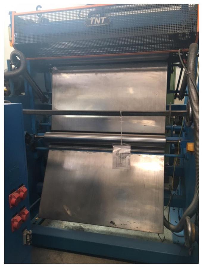 Used 1200mm wide TNT semi automatic winder  model M220. 1000mm max roll diameter 1996