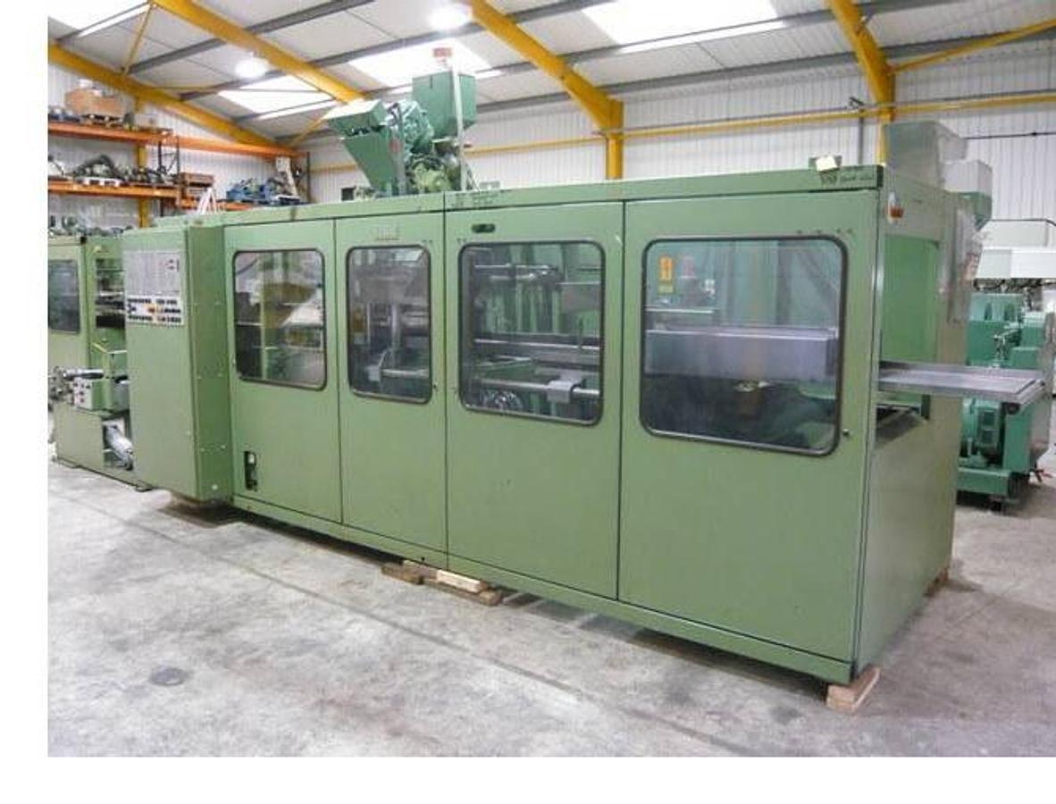 Used 350mm X 500mm Wide Illig RV53, vacuum forming machine With Steel Rule Punch Station, and stacker. 1989. Movable bottom platen.