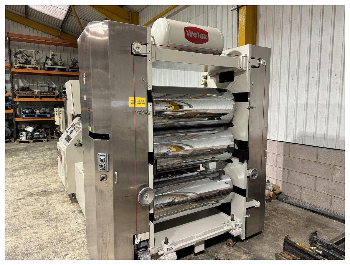 Used 1040mm wide Welex coextrusion sheet line with 90mm + 50mm extruders, GP, die, 1040mm wide x 450mm calender, pumps, haul off winder. 1996