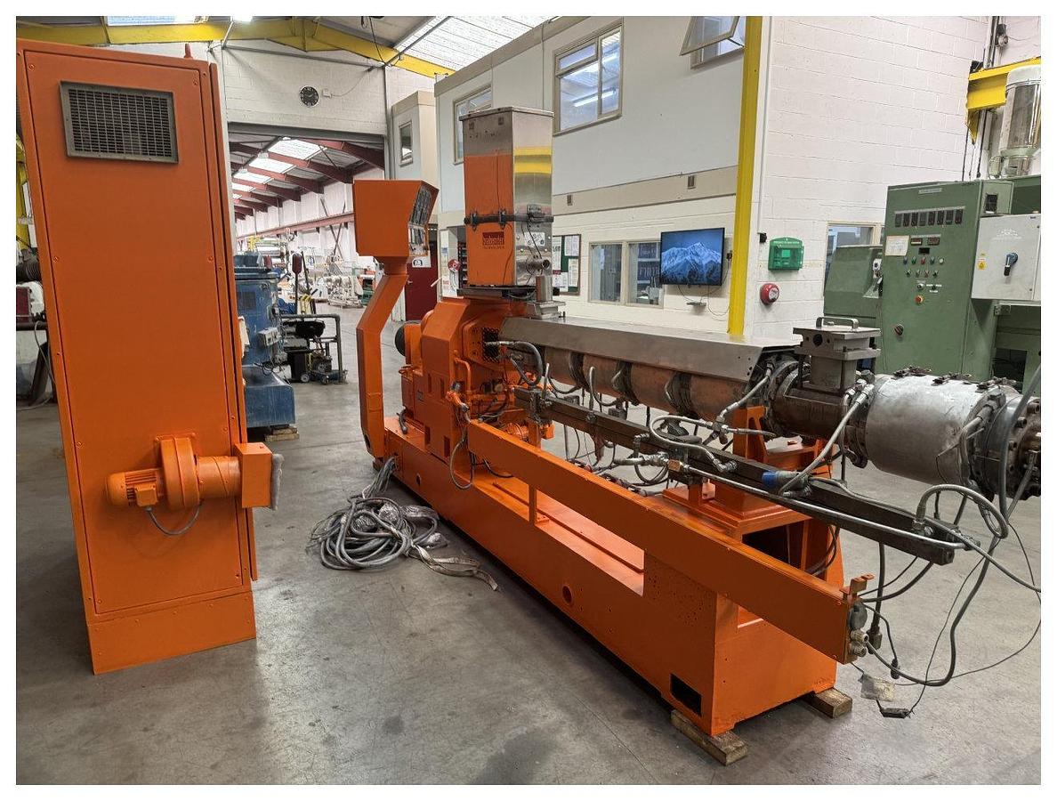 Used 67mm Leistritz Model ZSE67 GL 34D Twin Screw Extruder. 75kw Motor 300 Rpm Max Screw Speed. Double Vented With Control Panel. 1993