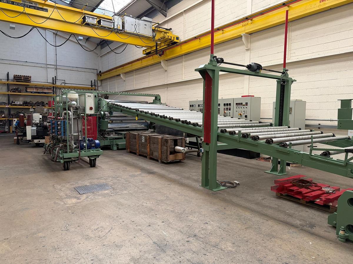 Used 2400mm Reifenhauser coextrusion sheet extrusion. 175mm Erwepa extruder, 90mm coextruder gear pump, Feedblock 2400mm die, 2400mm x 500mm rolls haul off in line knives.