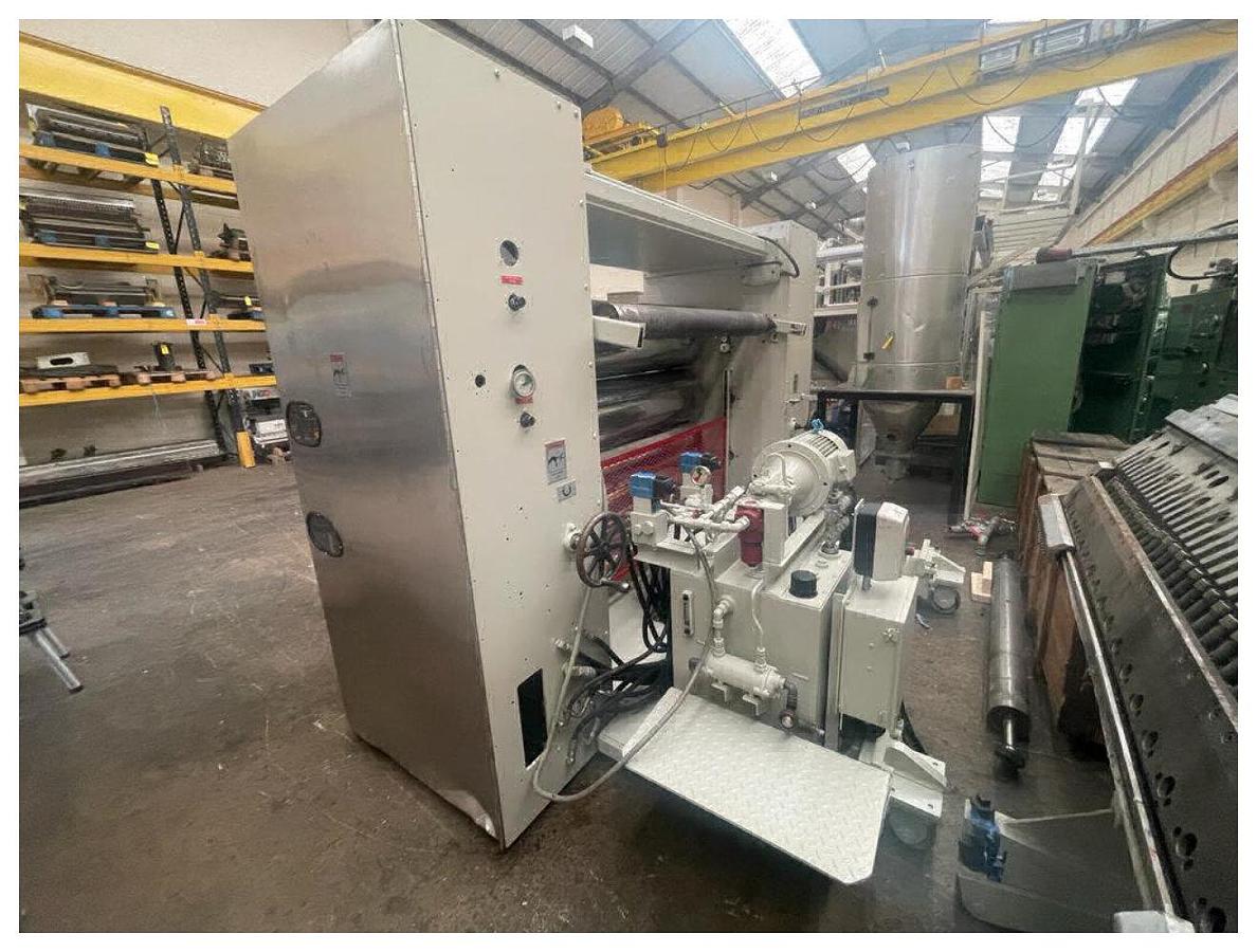 Used 1956mm Wide Welex 3 Roll Polishing Stack. 450mm diameter chrome rolls. . Hydraulic nip with power pack and accumulator. 2 roll haul off