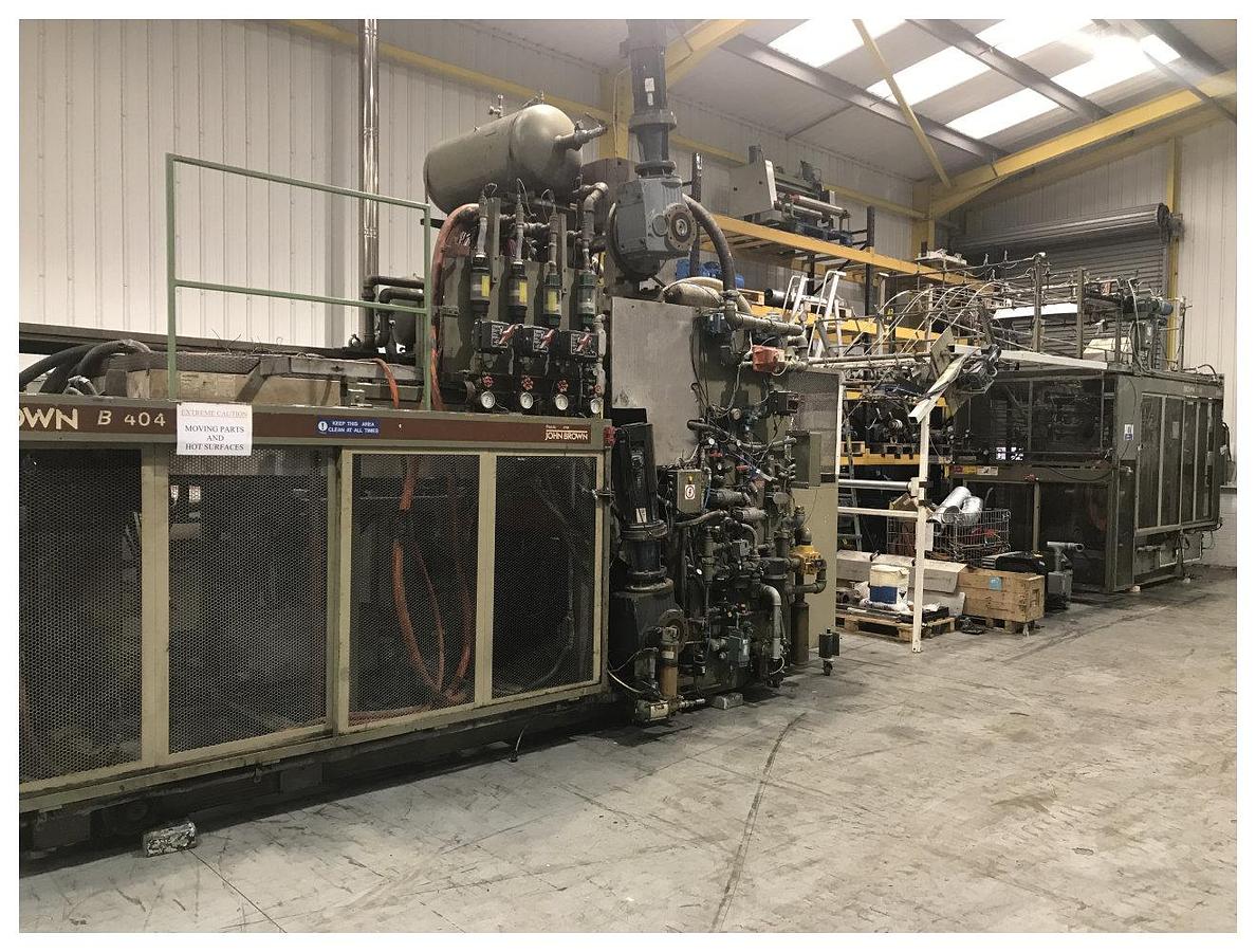 Used 40" Brown model B4042 thermoformer  , B4042 former and T340 trim press. 1996