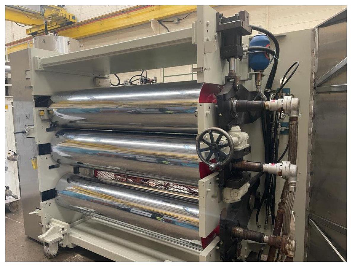 Used 1956mm Wide Welex 3 Roll Polishing Stack. 450mm diameter chrome rolls. . Hydraulic nip with power pack and accumulator. 2 roll haul off