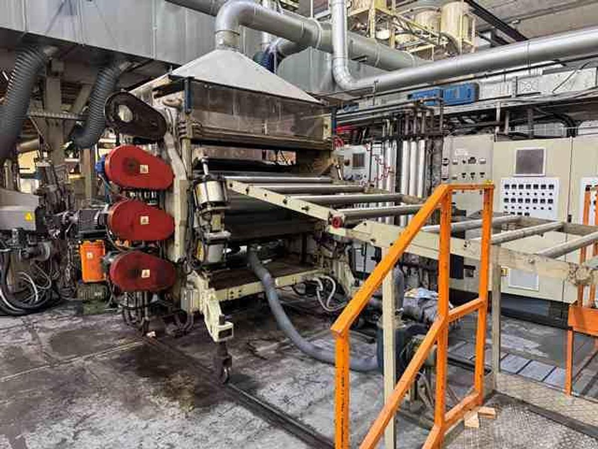 Used 1350mm wide Omipa coextrusion sheet line with 120mm 90mm 60mm extruders, feedblock,  1300mm x 400mm calender, pump group haul off, Guillotine. 1999