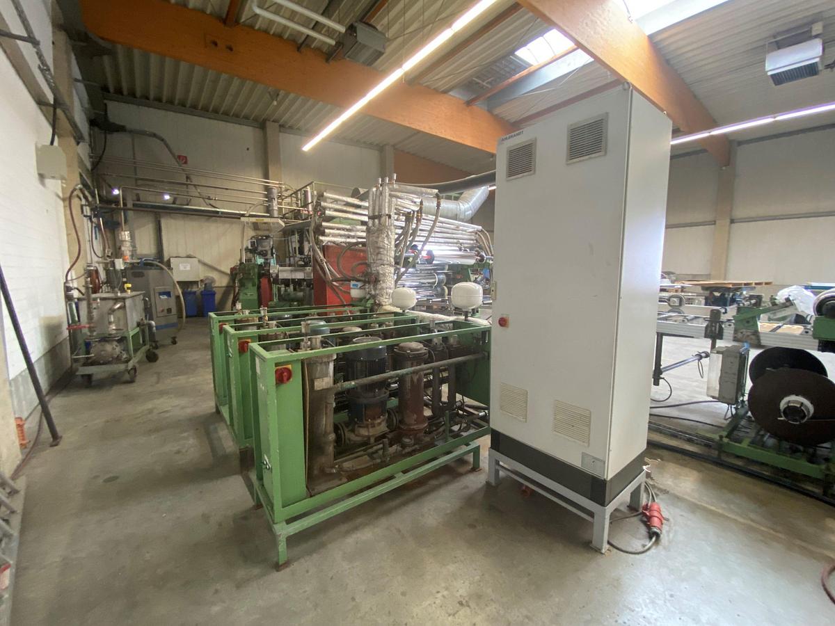 Used 1800mm wide Kuhne sheet extrusion line with 125mm primary Kuhne extruder, 1600mm flex lip die 1800mm 350mm diameter rolls, haul off guillotine