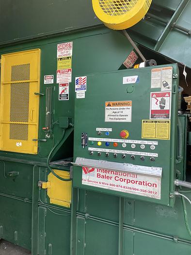 Used IBC Titan 6-EC Closed Door Baler, IBC 48" Infeed Conveyor, & Pioneer 2K Box Dumper