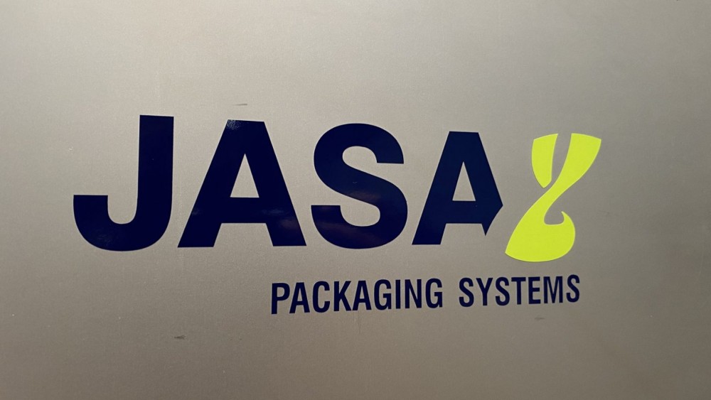 Used Fully automatic twin lane Jasa sleever, brand new