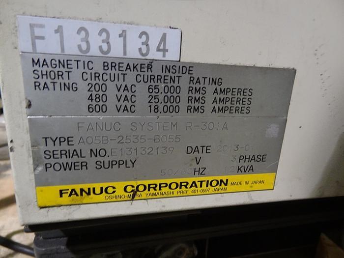 Used 2013 FANUC R2000iB/210F 6 AXIS CNC ROBOT WITH R30iA CONTROLLER EQUIPPED WITH 7TH AXIS DRIVE FOR SERVO GUN SPOT WELDING