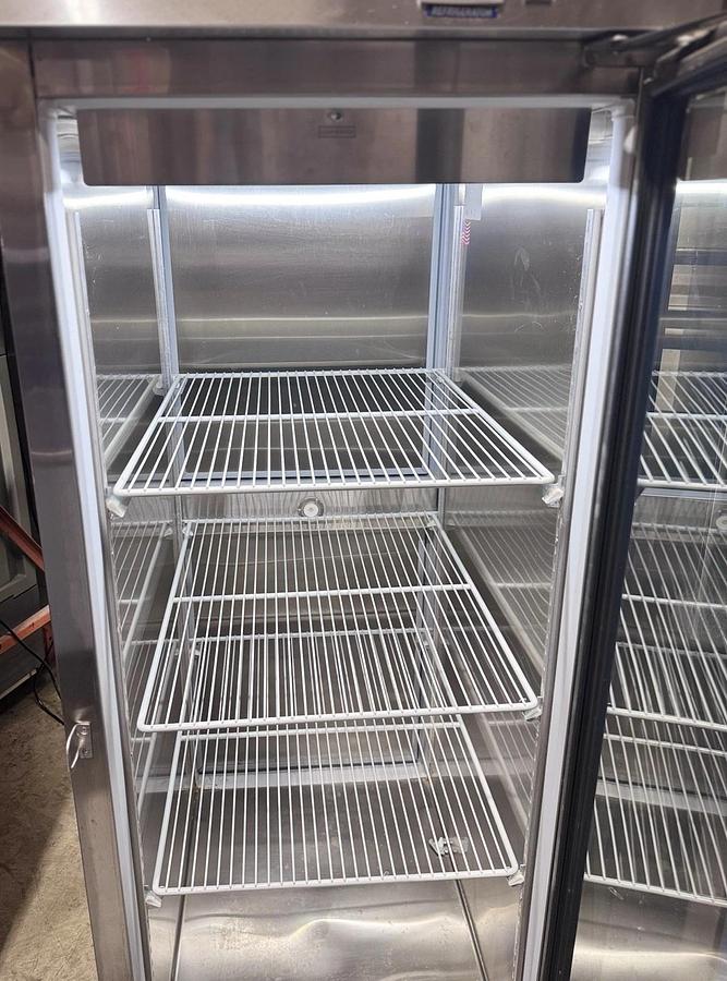 Used Norlake PR243SSG Stainless Steel Reach-In Refrigerator w/ Pass-Thru Doors, 1-Glass, 1-Solid Door