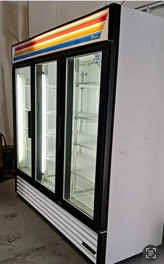Used True GDM-72F-HC-TSL01 3-Door Glass Door Merchandiser Freezer with LED Lighting