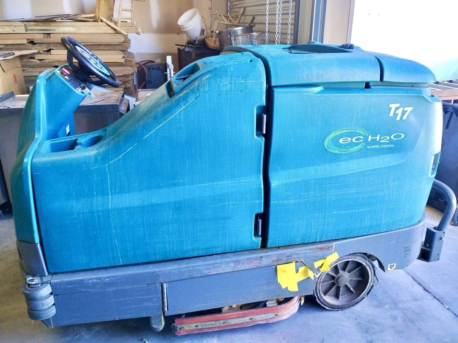 Used Tennant T17 ec H2O Battery-Powered Ride-On Floor Scrubber, 40" Cleaning Path