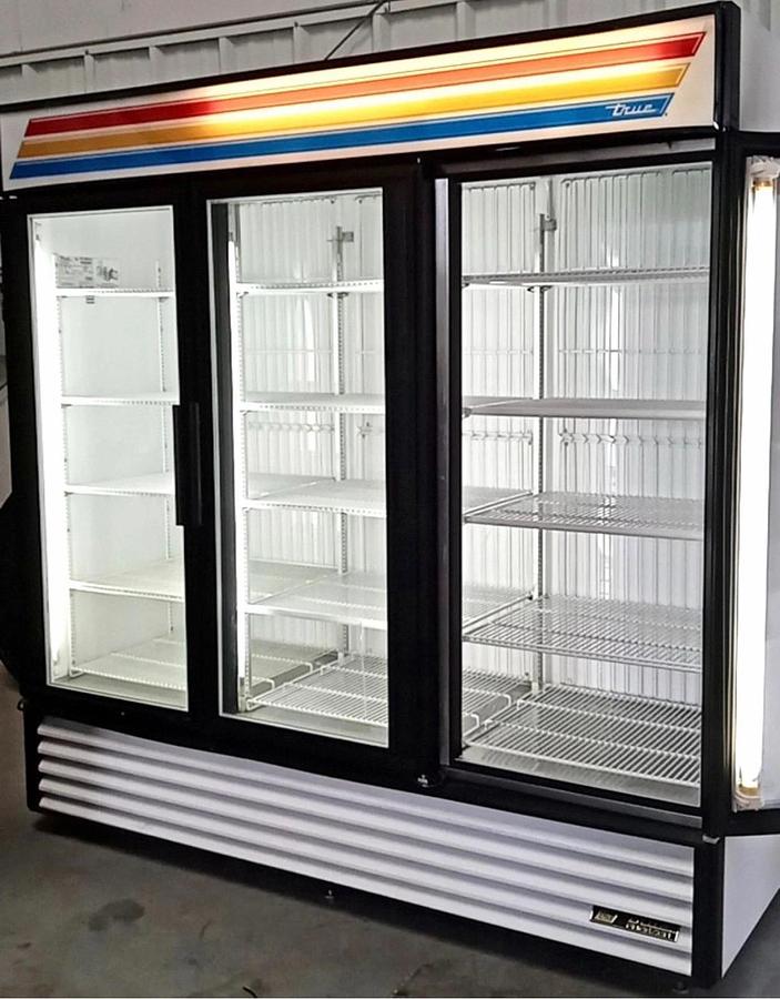 Used True GDM-72F-HC-TSL01 3-Door Glass Door Merchandiser Freezer with LED Lighting