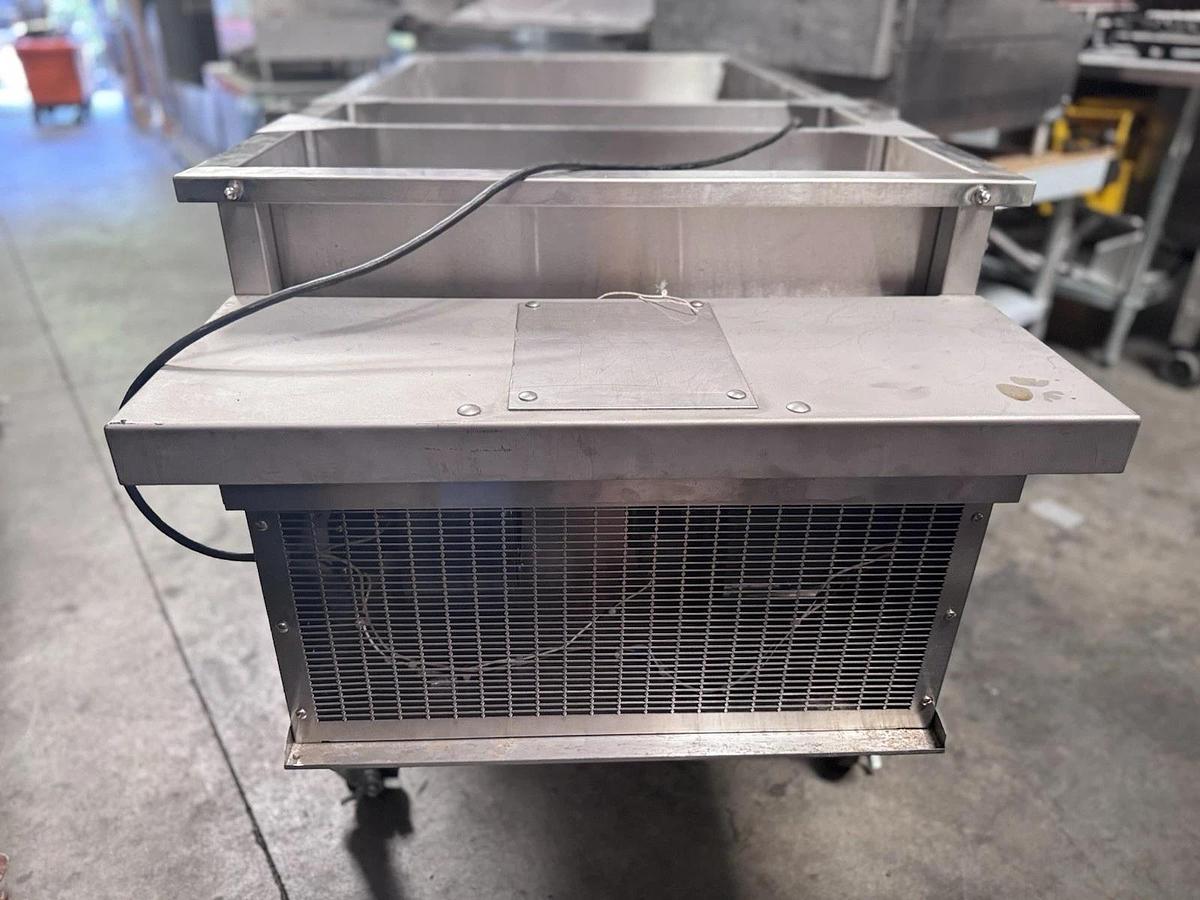 Used Cretors GCBKAS-X 70" 6 ft. S/S Popcorn Cooling Table with Fan and Double Shelves