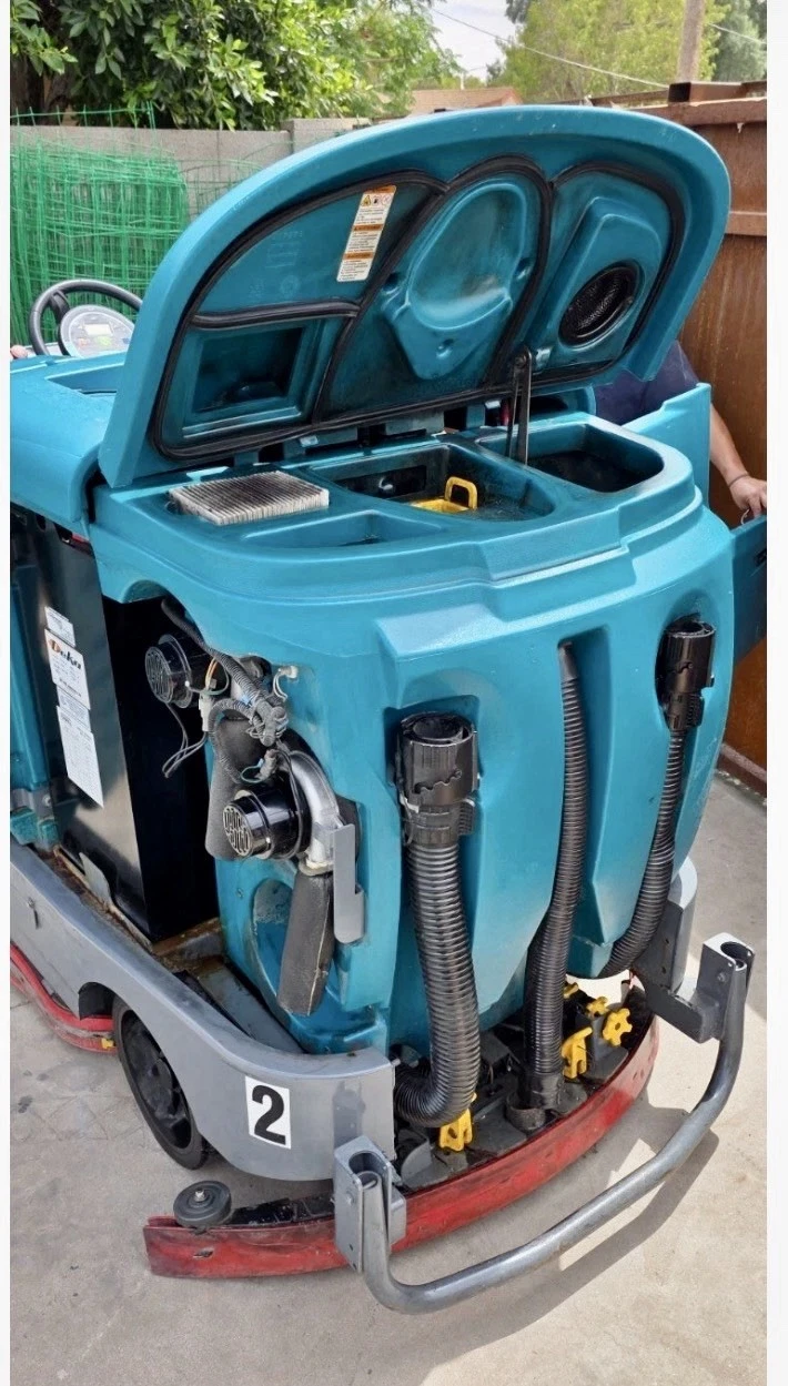 Used Tennant T17 ec H2O Battery-Powered Ride-On Floor Scrubber, 40" Cleaning Path