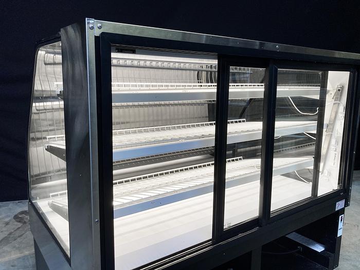 Used Gently Used Federal Showcase -- Dry Case, Lighted Shelves, Adjustable Shelf Angles, Model ECGD59. In stock, available for immediate pickup!