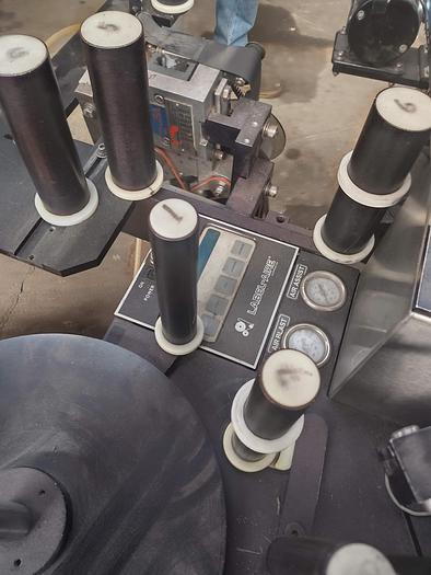 Used Labelaire pressure sensitive wrap labeler