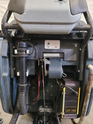 Used Convertamatic Floor Scrubber (A) with Built-in Charger.