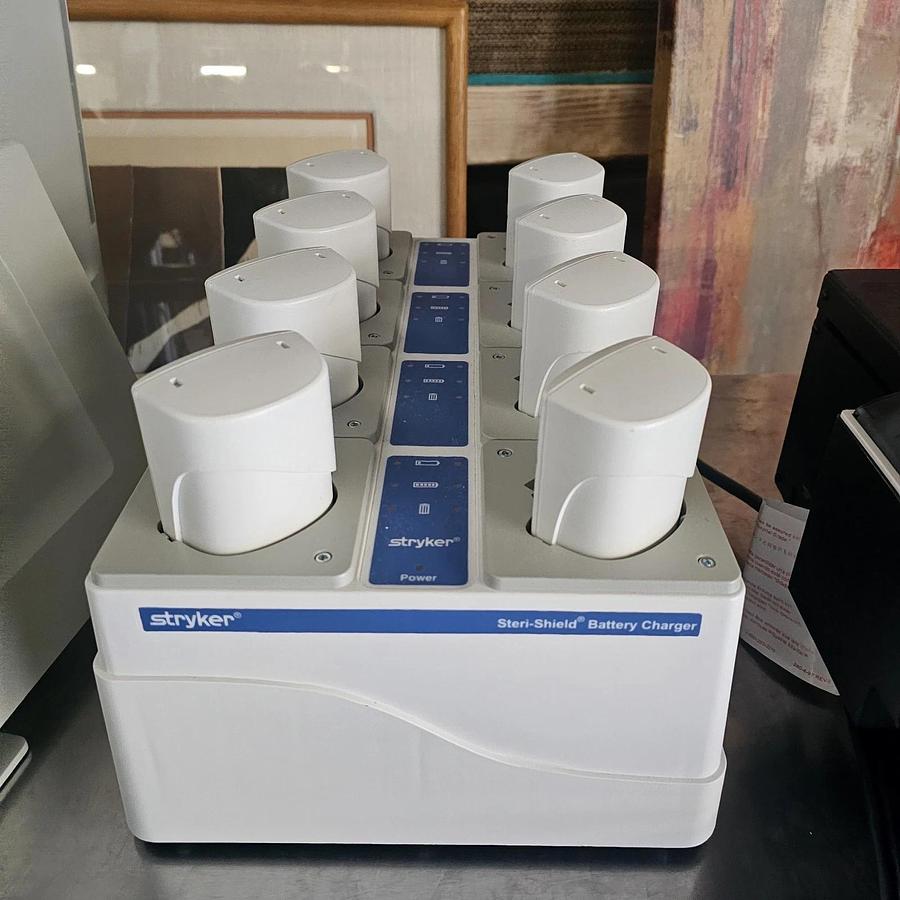 Used Stryker System T8 Personal Protection Battery Charger + 8 Batteries