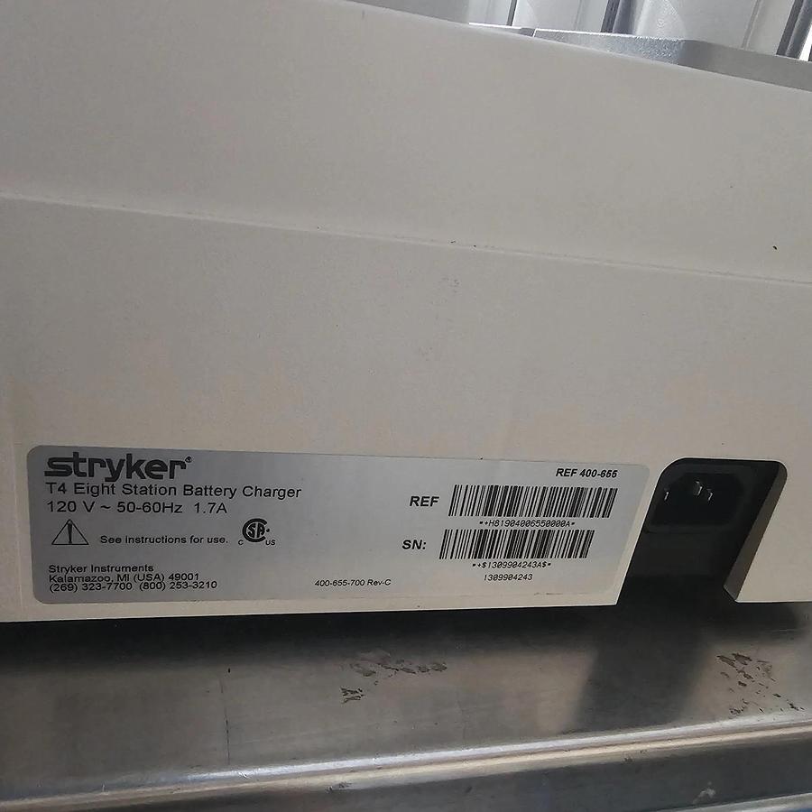 Used Stryker System T8 Personal Protection Battery Charger + 8 Batteries