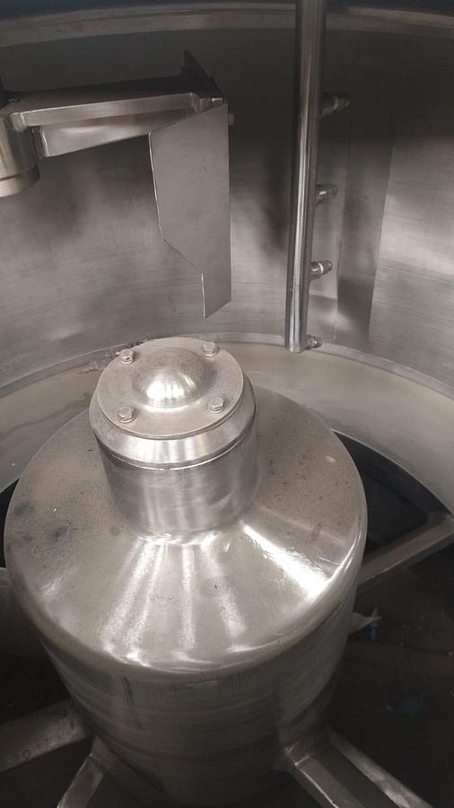 Usado Centrifuga de cestos com descarga automática , contínua .