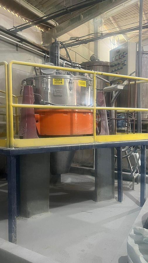 Usado Centrifuga de cestos com descarga automática , contínua .