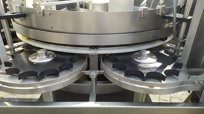 Used Napełniarka karuzelowa - gniazdowa w puszki, słoiki, opakowania plastikowe lub kartonowe firmy "MECOM"