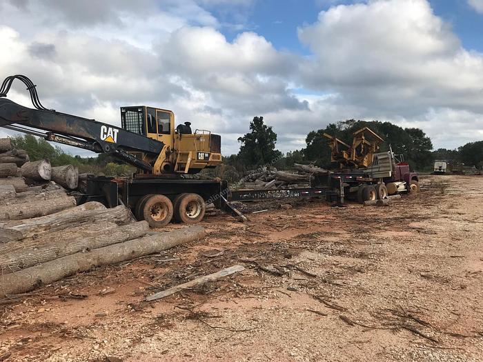 Used CAT 559 with Buck Saw