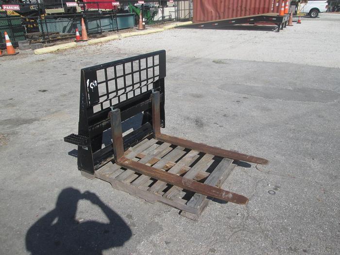 Used 48" Caterpillar Skid Steer Fork Attachment