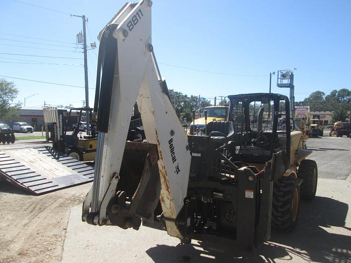Used Bobcat 8811 Skid Steer Backhoe Attachment